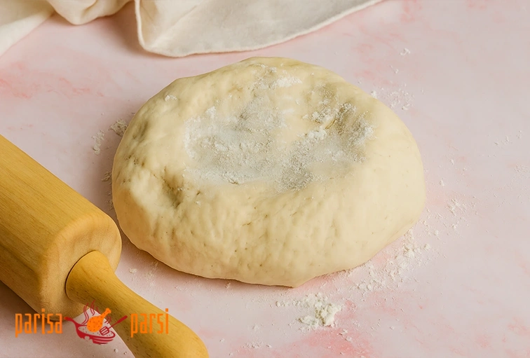 طرز تهیه خمیر پیتزا خانگی: ساده، سریع و حرفه ای 1 آموزش طرز تهیه خمیر پیتزا