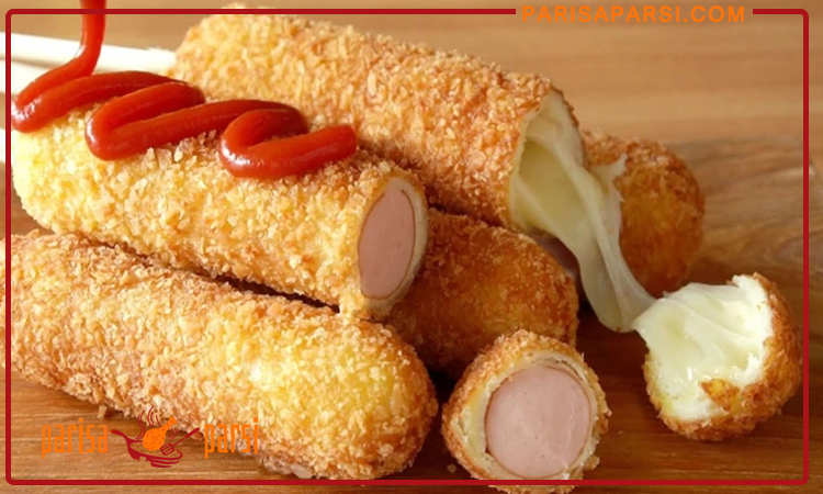 طرز تهیه کورن داگ پنیری کش دار 1 کورن داگ پنیری